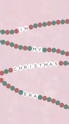 the words in my christmas era are spelled by circles on a pink background with red, green and white polka dots