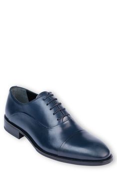 Handmade of smooth leather, this cap-toe dress shoe with a classic oxford silhouette offers a sophisticated, elegant look. Leather upper and lining/synthetic sole Made in Turkey Dress Shoe, Elegant Look, Smooth Leather, Derby, Dress Shoes Men, Dress Shoes, Men's Shoes, Leather Upper, Oxford