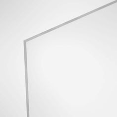 the corner of a white wall with an empty square on it's left side