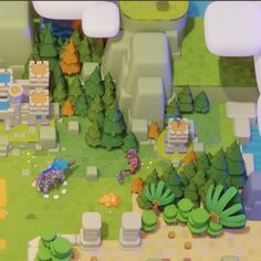 an image of a video game scene with trees, bushes and animals in the background