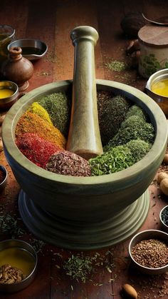 a mortar bowl filled with spices and herbs