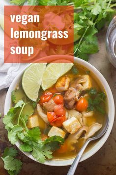 thai lemongrass soup in a bowl with cilantro and lime