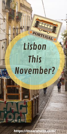 a trolley car with the words lisbon this november above it and people walking by