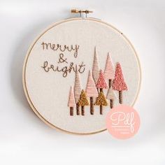 a hand embroidery pattern with trees and the words merry & bright