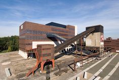 an aerial view of a building with stairs leading up to it