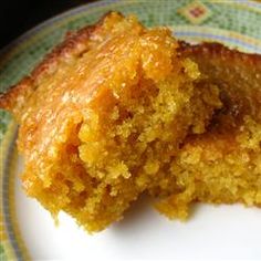 a close up of a piece of cake on a plate with a bite taken out