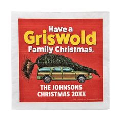 a napkin with a christmas tree on top of a car and the words have a griswold family christmas