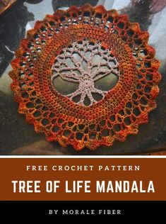 a crocheted tree of life is shown on top of a black table with the words free crochet pattern