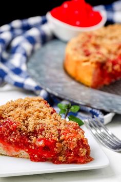 a slice of strawberry crumb pie on a plate