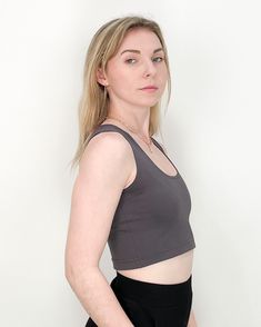 TO TRANSFORM: Wear with the high neckline in the front or flip it around and bring the scoop neck to the front and show a little chest. Sparrow crop is a cool, cropped version of our Sparrow top. PRODUCT DETAILS: - 60% Rayon, 33% Nylon, 7% Lycra- Moisture wicking and four-way stretch - Machine washable and dryer safe - MADE IN USA - Model: Talia is wearing a size small View our shipping and returns policy We'd love to hear from you! Email hello@paridaez.com with any questions. Fitted Crop Top With Built-in Bra And Scoop Back, Versatile Stretch Crop Top With Built-in Bra, Casual Gray Crop Top With Built-in Bra, Chic Seamless Fitted Crop Top, Chic Scoop Neck Crop Top With Built-in Bra, Fitted Bra Friendly Tops With Scoop Back, Fitted Top With Scoop Back And Bra Friendly, Versatile Tops With Built-in Bra And Scoop Neck, Fitted Scoop Back Top, Bra Friendly