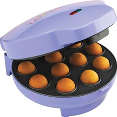 an electric muffin maker with twelve cupcakes in the bottom and one on the side