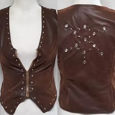 Rare Vintage 1940s-50s Brown Textured Leather Bling Embellished Conmatic Zipper Vest. - No Tags, Handmade - Conmatic Zipper From The 1940s-1950s - Soft Brown Textured Leather, Feels Like Suede - Deep V-Neck And Hem - Sleeveless - Shiny Rhinestones With Silver Based Piping - Rhinestone Star On Back - Rhinestones May Have Been Added Later - Fully Lined - Sexy Cut Size Extra Small-Small Approximate Measurements: Bust - 15.5 Inches Waist - 14.25 Inches Length (Shoulder To Point) - 20 Inches Vintage, Moto Vest, Zipper Vest, Biker Vest, Biker Chic, Brown Texture, Soft Brown, Brown Silver, Leather Vest, Vintage Jacket