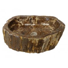 a round wooden sink on a white background