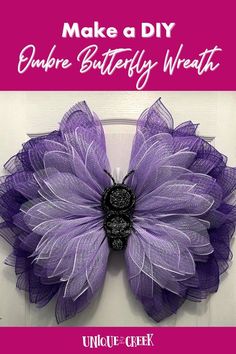 a purple and black flower with the words make a diy bubble butterfly wreath on it