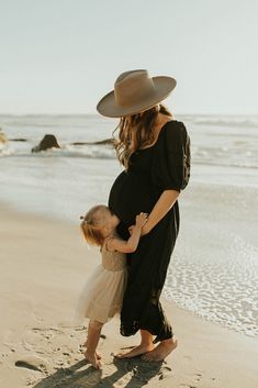 Black Dress Beach Photoshoot Family, Family Beach Pictures Pregnant, Maternity Photo Shoot Ideas Beach Family, Beach Maternity Pictures Ideas, Boho Beach Family Photos, Maternity Beach Session, Beach Family Maternity Photoshoot, Maternity Beach Photos With Toddler, Maternity Pics On Beach