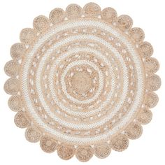 a round rug made out of crochet yarn on a white background with an intricate design