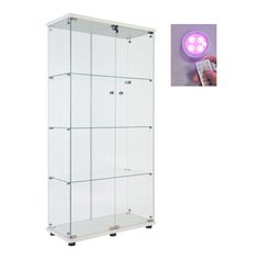 a glass display case with a remote control in it's right hand and an image of a purple light behind it