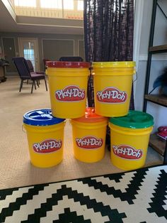 five buckets are stacked on top of each other