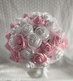 a bridal bouquet with pink and white flowers