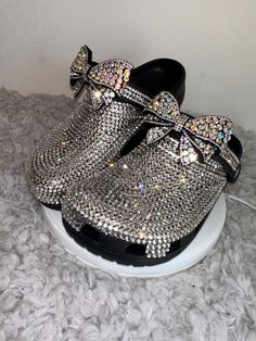 MyStyleMyWay's  custom crocs are designed for the perfect outfit, that special occasion, and "Just Because" you love blinged out crocs.  In the display shown we designed a pair of black  classic crocs adding high quality colorful rhinestones. 🎀 Each Rhinestone is individually and neatly placed to achieve the design.  🎀Rhinestones are added to the top portion of the shoe 🎀Bows are applied to the sports mode strap to this design to add cuteness and personality.  🎀This design do not have charms, charms can be added please contact us directly or visit our website www.MyStyleMyWay.co to view our charm selection.  🎀When making your purchase - You're making a purchase for the exact style shown. If you would like a different color rhinestone,  and or different charms please message us so we c Delta Sigma Theta Bling Crocs, Bling Crocs Shoes Blue, Customized Crocs Shoes, Painted Crocs, Blinged Out Crocs, Blinged Crocs, Bedazzled Crocs, Croc Ideas, Shoe Bows