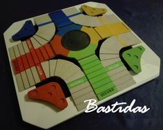 a close up of a board game on a table with the words bastidas