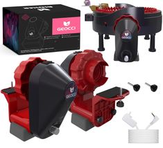 a red and black machine is next to some other items that are in front of it