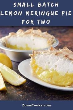 small batch lemon meringue pie for two on a table with sliced lemons