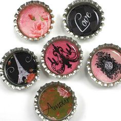 six bottle caps with different designs on them