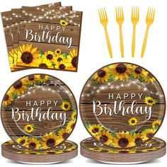 sunflowers are on the table with happy birthday plates and forks