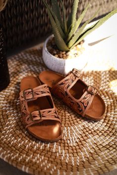 True to size fit but we recommend sizing up if you’re in between sizes Genuine hand tooled leather with rubber sole These are perfect for Spring & Summer and even make the best transitioning to Fall sandal! Tooled Leather Sandals, Western Leather Work, Fall Sandals, Leather Goodies, Bohemian Beach Dress, Western Style Outfits, Pumped Up Kicks, Western Aesthetic, Bohemian Beach