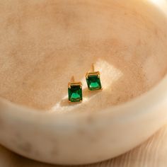 Everything about our Emerald Cut Birthstone Studs make them a must-have staple for your collection. From its personalized touch to its minimalist style — these gemstone earrings coordinate effortlessly with any outfit. Wear them as everyday earrings to work and play, or pair them with a fancier outfit for a night out! They also make special personalized gifts for all the women in your life. Makes sense why they're such a crowd favorite! Material: High Quality Solid 925 Sterling Silver Finish: 18 Everyday Gold Plated Birthstone Earrings, Dainty Everyday Gemstone Earrings, Minimalist Gemstone Earrings For May Birthstone, Fine Jewelry Birthstone Earrings For Everyday, Everyday Fine Jewelry Earrings With Birthstone, Minimalist Yellow Gold Earrings For May Birthstone, Classic Gemstone Earrings For Everyday, Minimalist Yellow Gold May Birthstone Earrings, Classic Everyday Gemstone Earrings