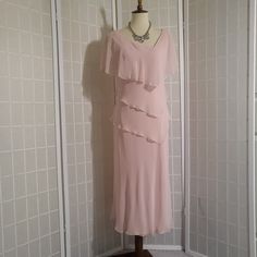 Brand: Vintage Size: 8 Condition: Vintage Closure: Zip Material: Poly Specialty: Layered Color: Powder Pink Pattern: Plain Lining: Yes Problem: Pink Tiered Dress For Formal Occasions, Formal Pink Tiered Dress, Formal Tiered Pink Dress, Elegant Pink Tiered Midi Dress, Elegant Fitted Tiered Maxi Dress, Elegant Pink Tiered Dress, Fitted Tiered Formal Dress, Elegant Tiered Cocktail Dress, Spring Feminine Formal Mother Of The Bride Dress