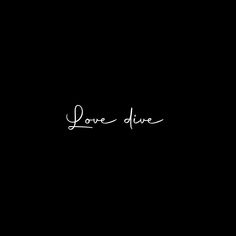 the word love drive written in cursive writing on a black background with white ink