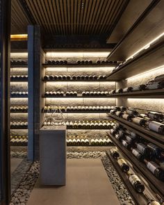 the wine cellar is full of many bottles