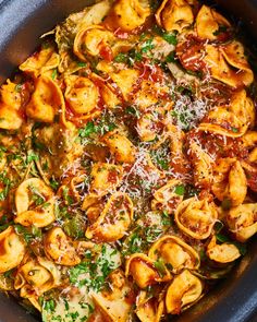 pasta with sauce and parmesan cheese in a slow cooker