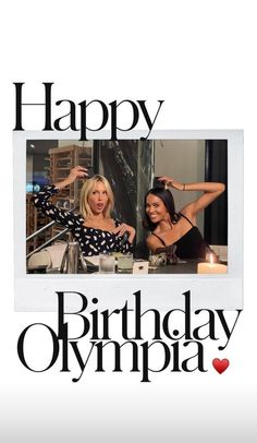 two women sitting at a table in front of a happy birthday card with the words,'happy birthday olympics '