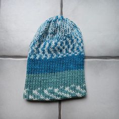 This super soft and plush hat is made from acrylic gauge 4 worsted yarn. The material is 80% acrylic and 20% wool and feels very soft. This hat will fit a medium to large adult, pending your head size. Unstretched it is 10 inches tall and 7.5 inches wide. It is very stretchy so it can stretch to be about 12 inches wide so it will fit a variety of heads.  It is a regular knitted pattern, double walled for an extra layer of warmth. It can be worn as a more slouchy beanie style or pulled down over the ears.  Machine washable and dryer friendly on cold wash and low heat. If you would like a custom hat or pattern let me know! Blue One-size Knit Beanie, Blue One Size Knit Beanie, Blue Knit Beanie Cap, Knitted Acrylic Beanie Cap, Blue Knit Winter Hat, Acrylic Knitted Beanie Cap, Blue Acrylic Yarn Winter Hat, Blue Acrylic Hat, One Size Fits All, Blue Acrylic Hat, One Size