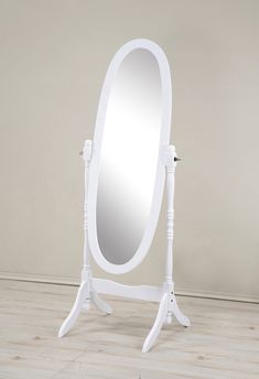 a white wooden stand with a mirror on it