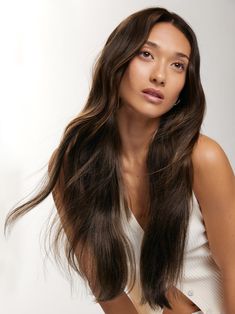 A dimensional dark brown with a short espresso brown root smudge, with warm brown lowlights, and coffee brown highlights. faq what-lengths-do-you-offer how-do-i-choose-the-right-luxy-hair-set what-is-the-difference-between-classic-and-seamless-extensions can-i-dye-curl-and-straighten-my-hair-extensions how-do-i-care-for-my-extensions how-long-does-shipping-take-1 Coffee Brown Highlights, Warm Brown Lowlights, Brown Root Smudge, Brown Extensions, Brown Lowlights, Root Smudge, Halo Extensions, Fourth Trimester, Luxy Hair