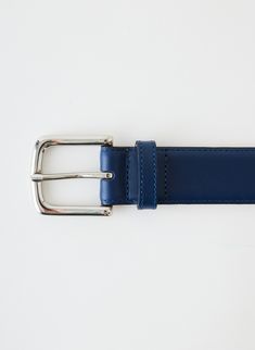 This classic men’s leather belt is made of 100% genuine leather and will elevate any pant with its sleek and timeless look. Available in black, brown, and ultramarine blue this belt will be the newest addition to your 12 Mo’er collection. 100% Cow Leather Style Number: AF22MB0174 Available in: Black, Brown, Ultramarine Blue, White Modern Bridle Leather Belt For Business, Luxury Blue Leather Belt, Luxury Blue Belt For Formal Occasions, Luxury Blue Formal Belt, Blue Leather Belt Buckles With Removable Belt, Elegant Blue Leather Belt, Ultramarine Blue, Leather Belts Men, Leather Style