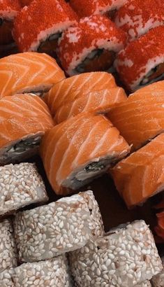 sushi and other foods on display in a store