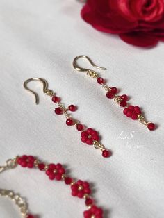 Handcrafted with love, these delicate floral earrings feature sparkling spinel gemstones set in a charming daisy design. Perfect for adding a touch of nature-inspired beauty to any outfit. 🌸✨ Spinel Gemstones Handmade Earrings DETAILS:  🌸 Genuine Spinel, Faceted rounded , Pure red (slightly darker) 🌸 High quality Japanese beads 🌸 14k gold-filled ear wires, Diameter 0.7mm, Hypoallergenic  🌸 Size:   Width 0.6cm  Length 4cm   -- -- --  Free Shipping on orders over HKD 300 (about $39/€37). No C Jewellery Designs, Red Flower Earrings With Colorful Beads As Gift, Flower Bead Earrings, Red Beaded Earrings, Beaded Flower Earrings, Handmade Red Flower Beaded Earrings, Red Beaded Dangle Flower Earrings, Red Beaded Flower Earrings, Multicolor Flower-shaped Earrings With Dangling Beads