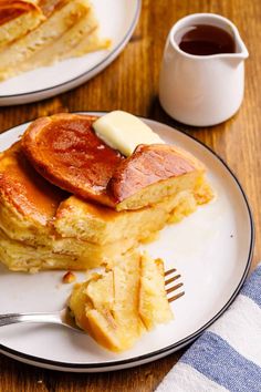 pancakes with butter and syrup on a plate