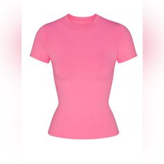 Skims Cotton Jersey T-Shirt Nwt Large Limited Edition Color Sugar Pink Sold Out Online Our Viral T-Shirt In The Cotton Everyone Craves. This Perfect Five-Star Tee Is Made With Our Stretchy, Lightweight Cotton That Enhances Your Curves With Its Body-Hugging Fit And Elevates Your Comfort With Its Incredibly Soft Feel. Features Stitching Details Along The Short Sleeves And Hem And Hits Below The Natural Waist. Fits True To Size. Fitted Crew Neck T-Shirt, Pickstitch Detail Along Sleeves And Hem, Hit Pink Fitted Top With Short Sleeves, Pink Fitted Short Sleeve Top, Pink Fitted Short Sleeve Crew Neck Top, Pink Fitted Crew Neck Short Sleeve Top, Fitted Pink Short Sleeve T-shirt, Fitted Pink Short Sleeve Crew Neck Top, Pink Fitted Cotton T-shirt, Pink Fitted Crew Neck Shirt, Pink Fitted Basic T-shirt