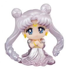 an anime figurine with blonde hair and blue eyes, wearing a white dress