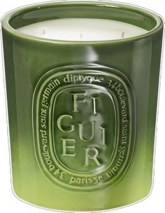 a green candle with the word gufer on it's front and bottom side