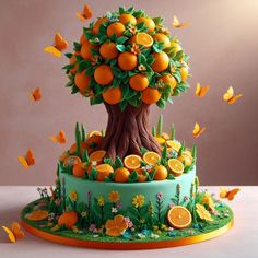 there is a cake with oranges on it and butterflies flying around the tree in the air