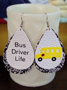 These absolutely adorable earrings are perfect unique gift for your child's bus driver.  We entrust these wonderful people to keep our children safe on the way to school.  These light weight earrings are 2.5 inches long. The design is made with 651 Oracle permanent vinyl. Cricut Earrings, Bus Driver Gifts, Holiday Bows, Mini Earrings, Glitter Earrings, Bus Driver, Awareness Ribbons, Back To School Gifts, Christmas Bows