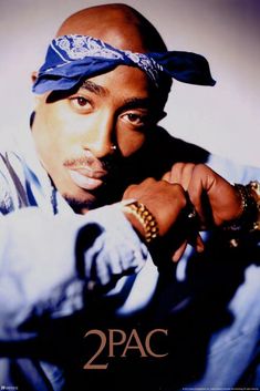 a man with a bandana on his head is posing for a poster that says 2pac