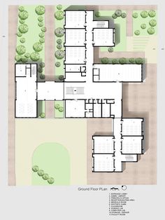 an aerial view of the ground plan for a building with lots of trees and grass